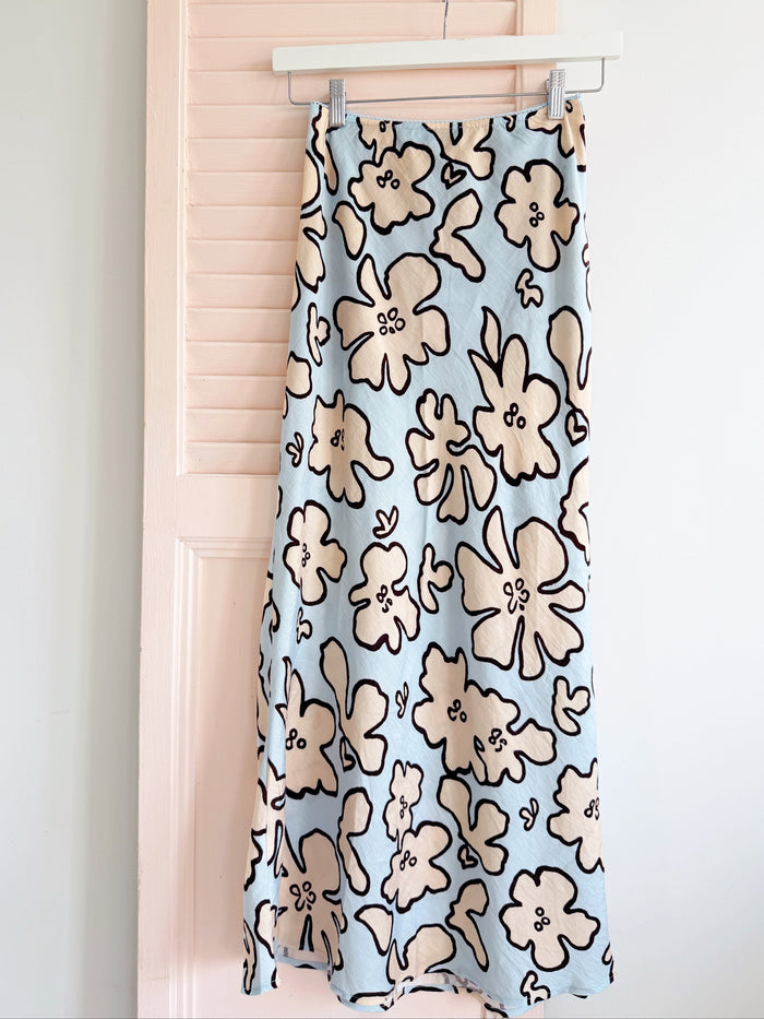 Women's linen pull on maxi skirt in sky blue with pastel yellow flowers