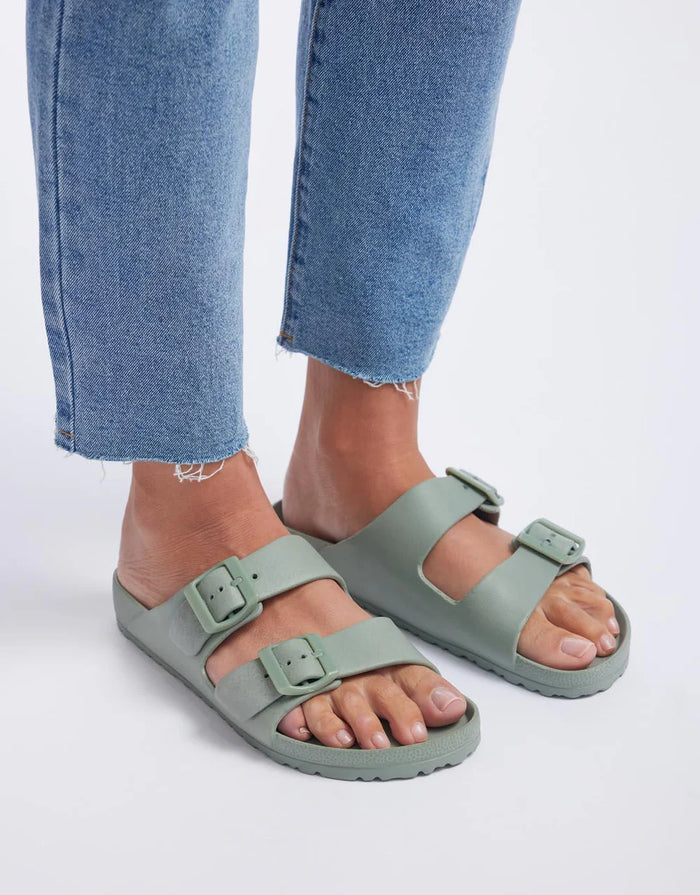 Women's light green slide sandals
